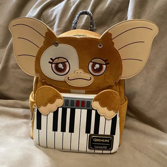 Loungefly Gremlins Santa Gizmo Piano Brown and Red Backpack and Wallet Loungefly Gremlins Gizmo Holiday Cosplay w/ Removable Hat  main image 2